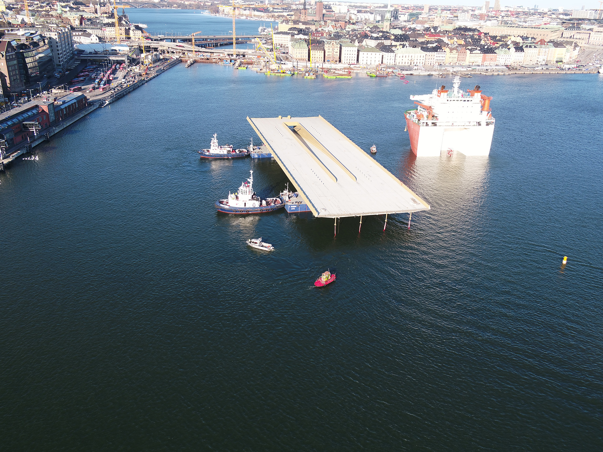 Towing the bridge to the quay.